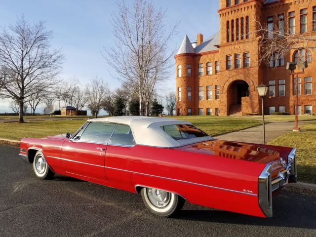 1966 red Cadillac DeVille Convertible