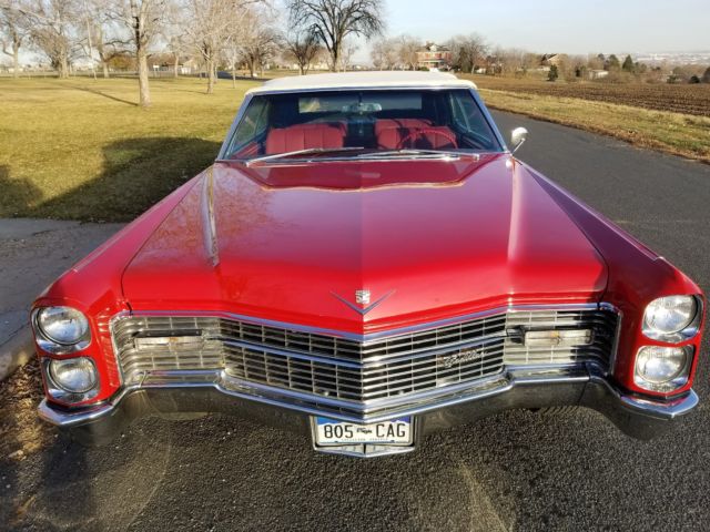1966 red Cadillac DeVille Convertible