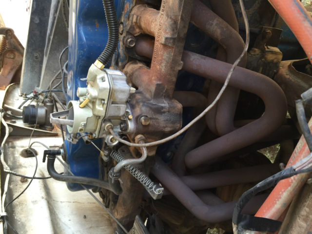 1965 white over red Ford F-100 Standard Cab Pickup