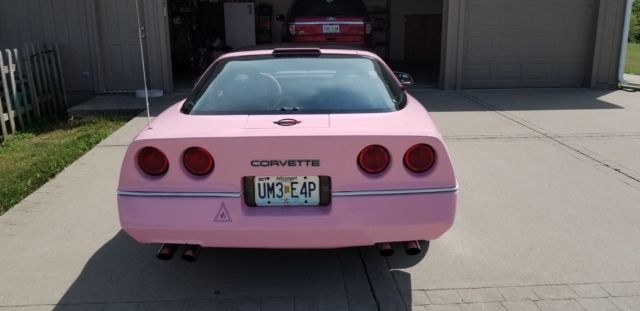 1987 pink Chevrolet Corvette