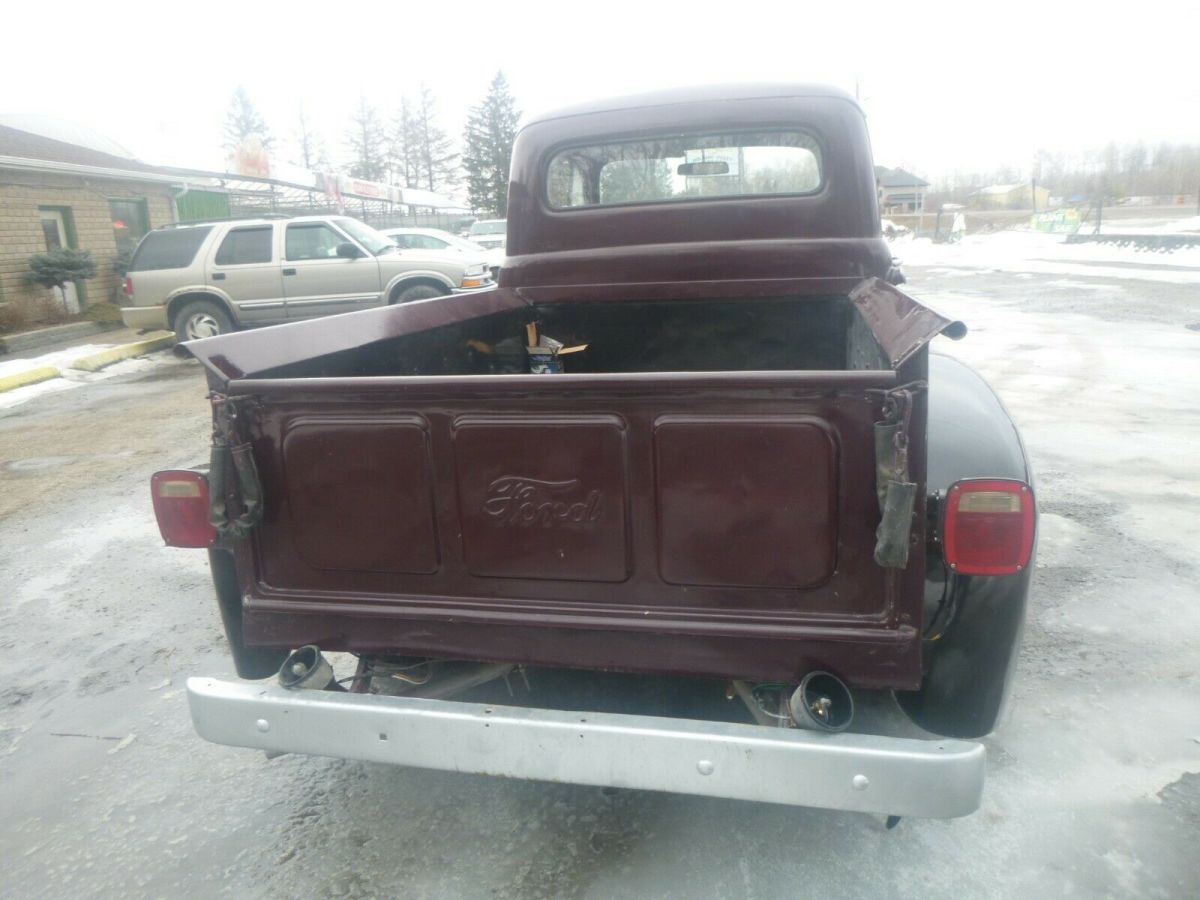 1952 Red Ford F-100 Standard Cab Pickup