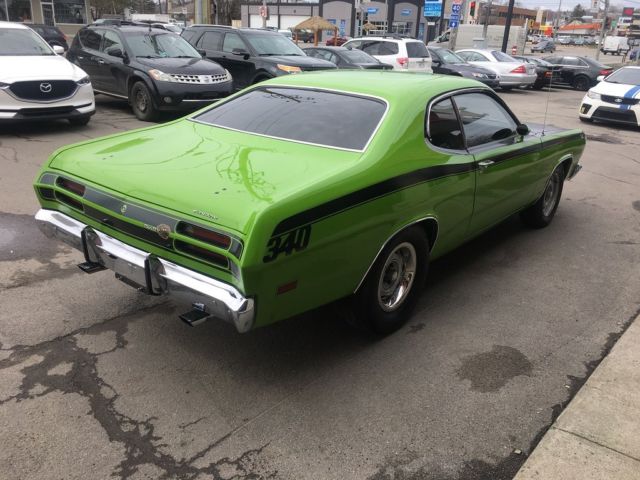 1971 Green Plymouth Duster Coupe