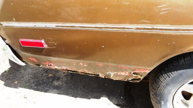 1973 Brown Plymouth Duster Coupe