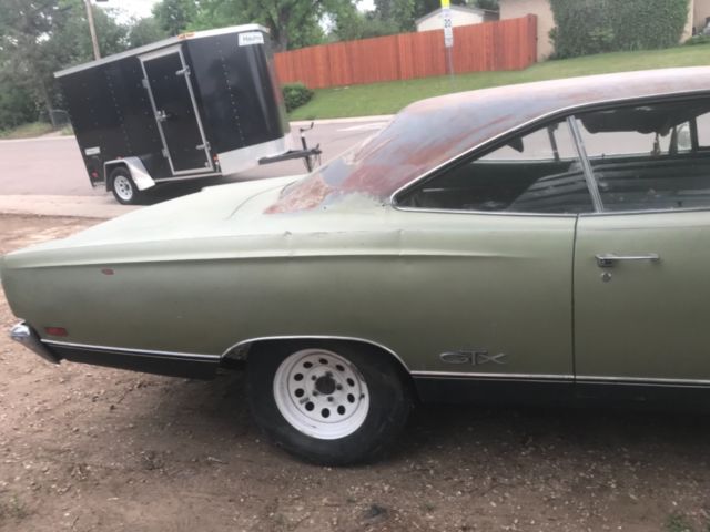 1969 Metallic green Plymouth GTX Coupe