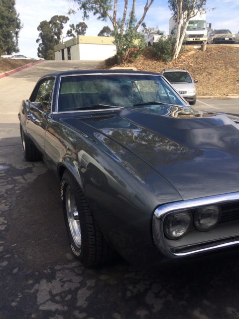 1967 Silver/BlackTop Pontiac Firebird 2 door.