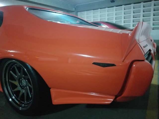 1969 Orange Pontiac GTO Coupe