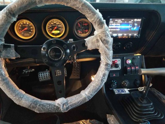 1969 Orange Pontiac GTO Coupe