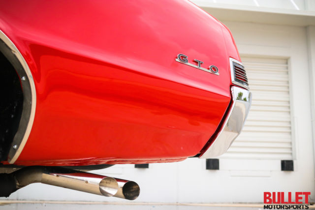 1965 Red Pontiac GTO Coupe