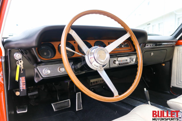 1965 Red Pontiac GTO Coupe