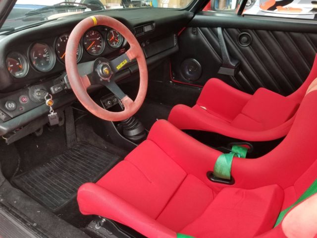 1979 red Porsche 911 Coupe
