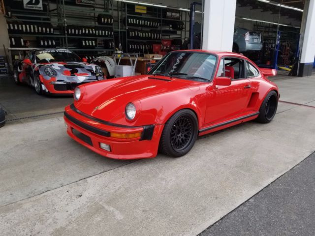 1979 red Porsche 911 Coupe