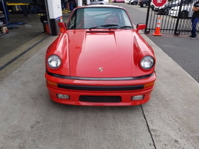 1979 red Porsche 911 Coupe