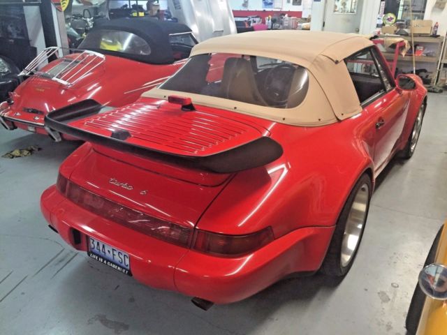 1990 red Porsche 911 Convertible