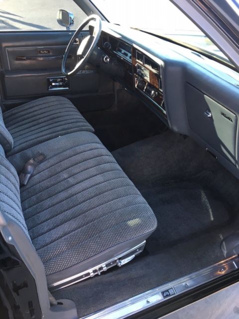 1986 Black Oldsmobile Custom Cruiser Wagon
