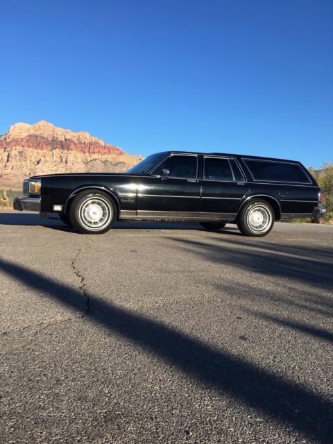 1986 Black Oldsmobile Custom Cruiser Wagon