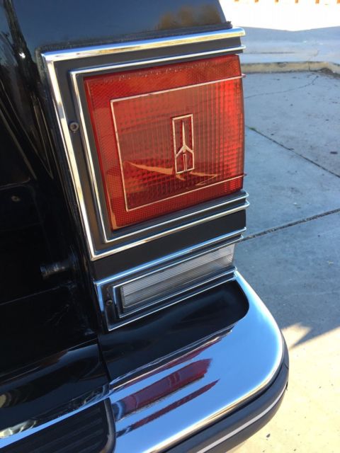 1986 Black Oldsmobile Custom Cruiser Wagon