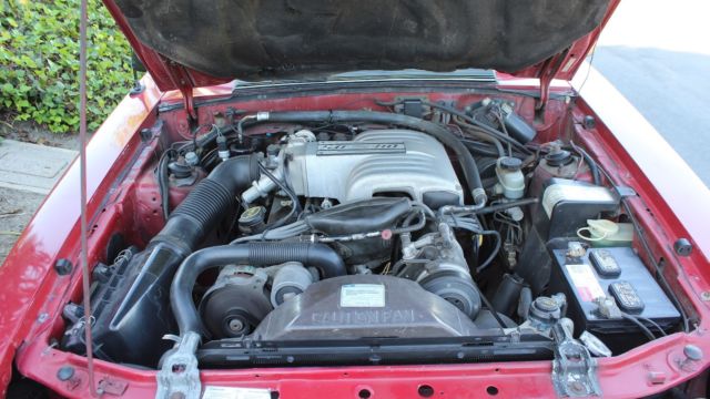 1987 Burgundy Ford Mustang Convertible