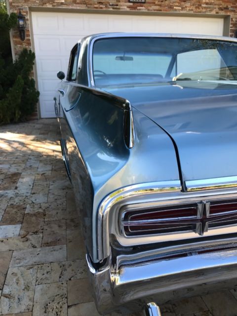 1964 Blue Oldsmobile Starfire