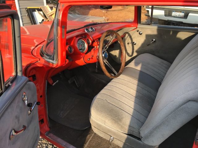 1957 Orange Chevrolet Bel Air/150/210 Sedan