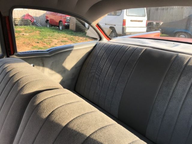 1957 Orange Chevrolet Bel Air/150/210 Sedan