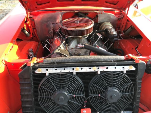 1957 Orange Chevrolet Bel Air/150/210 Sedan