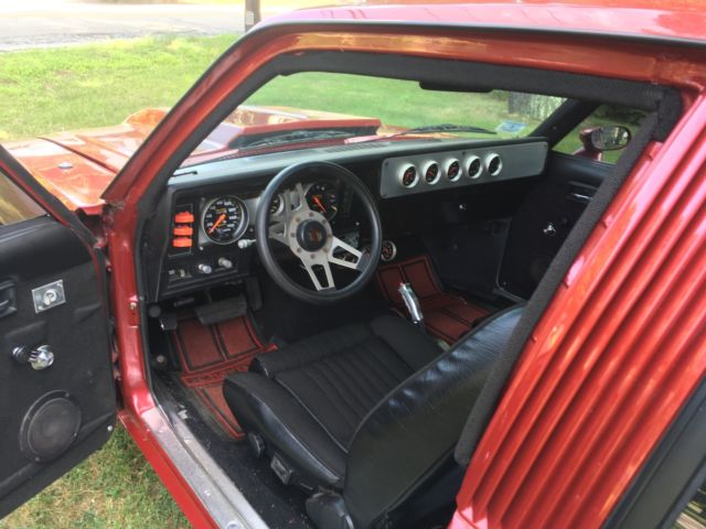 1978 red Chevrolet Nova Coupe
