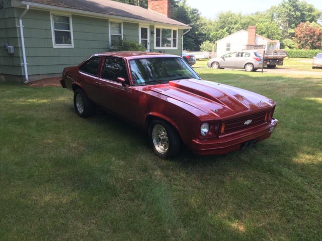 1978 red Chevrolet Nova Coupe