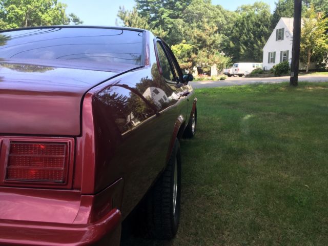 1978 red Chevrolet Nova Coupe