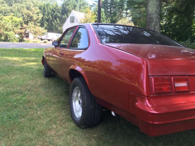1978 red Chevrolet Nova Coupe