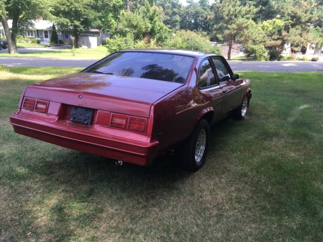 1978 red Chevrolet Nova Coupe