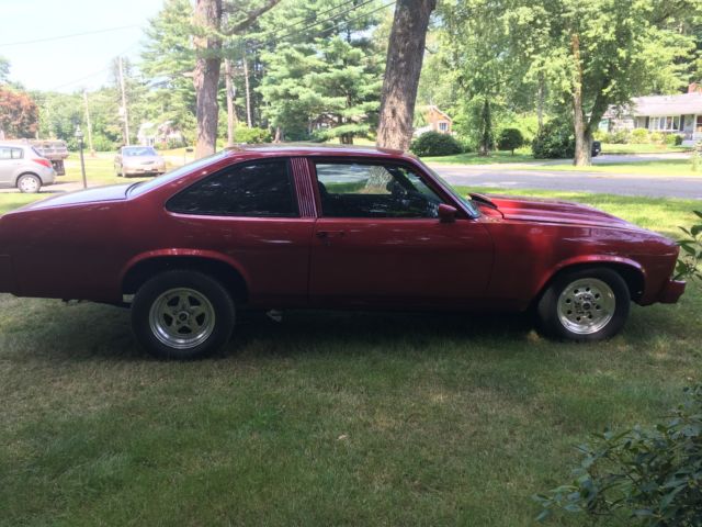 1978 red Chevrolet Nova Coupe