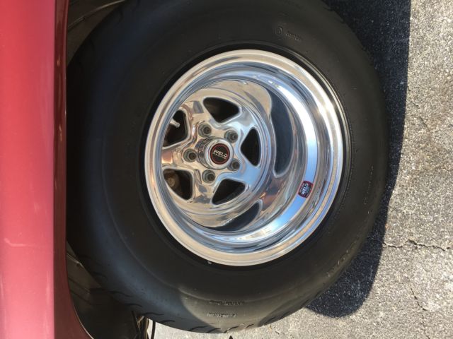 1965 maroon Chevrolet Corvette Coupe