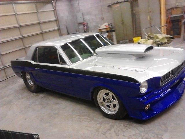 1965 blue/silver Ford Mustang Coupe