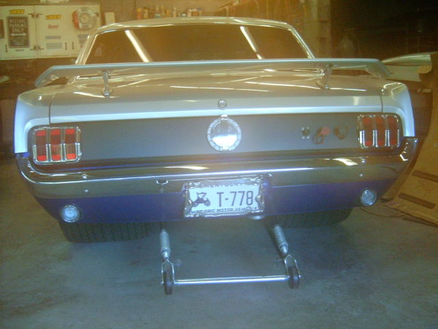 1965 blue/silver Ford Mustang Coupe