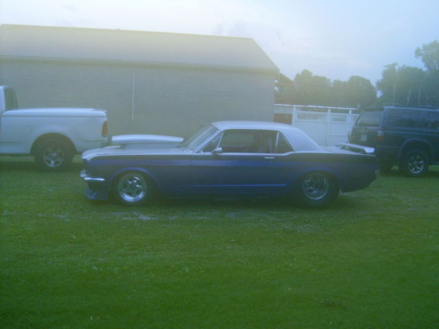 1965 blue/silver Ford Mustang Coupe