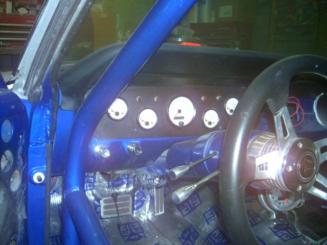 1965 blue/silver Ford Mustang Coupe