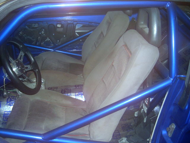 1965 blue/silver Ford Mustang Coupe