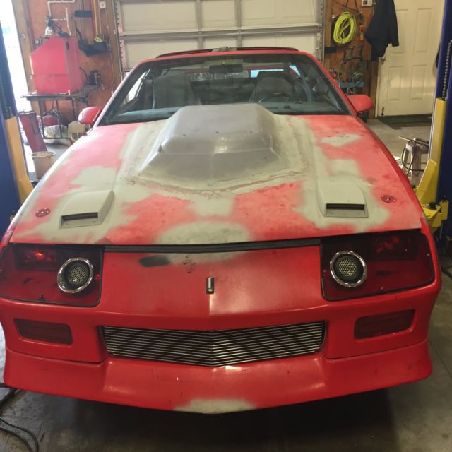 1986 Red primed Chevrolet Camaro Coupe
