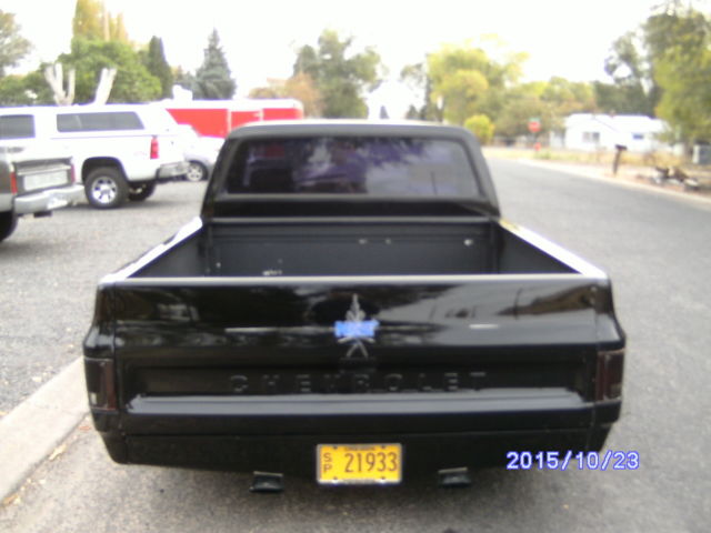1985 Custom Black with blue flames Chevrolet C-10 Standard Cab Pickup