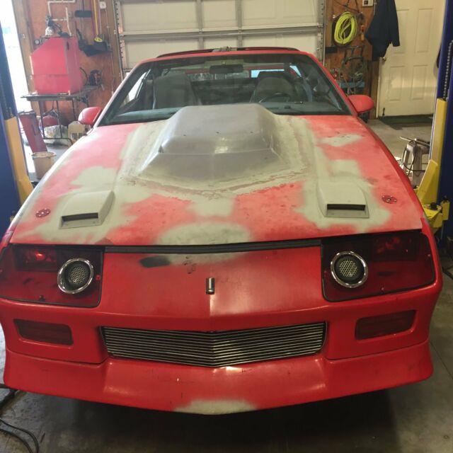 1986 Red primed Chevrolet Camaro Coupe