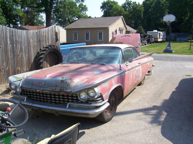 1959 Red Buick LeSabre 2 door coupe