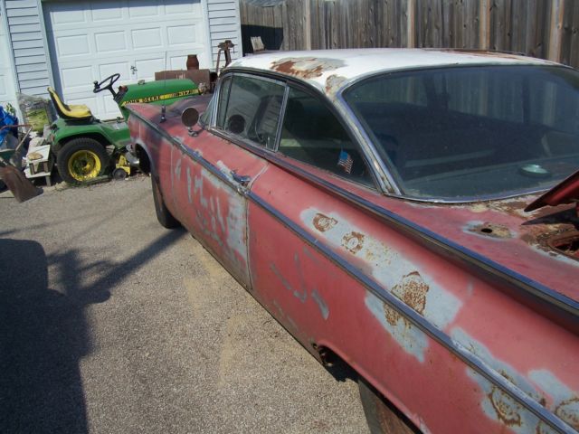 1959 Red Buick LeSabre 2 door coupe