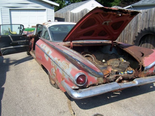 1959 Red Buick LeSabre 2 door coupe