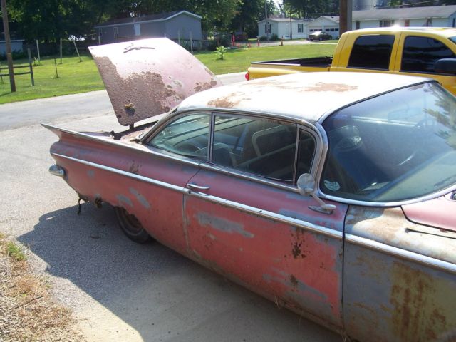 1959 Red Buick LeSabre 2 door coupe