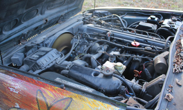 1988 Multi-Colored Jaguar XJ6 Sedan