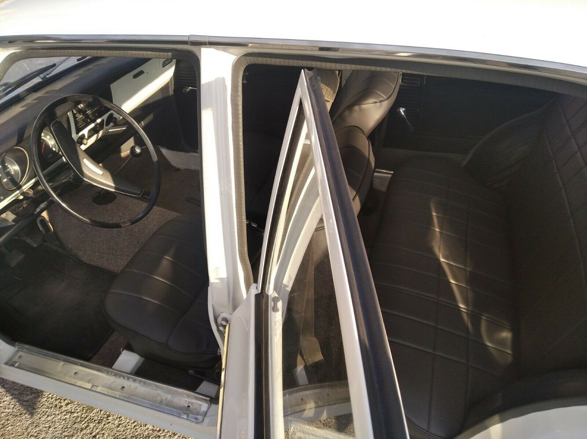 1969 White Toyota Corolla Sedan