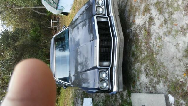 1976 blue Ford Ranchero Pickup Truck