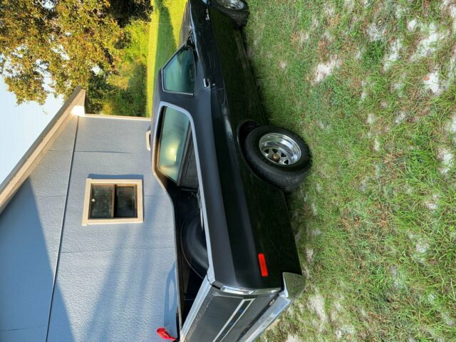 1976 blue Ford Ranchero Pickup Truck