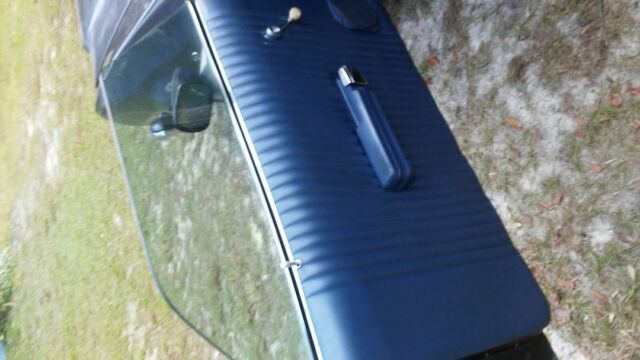 1976 blue Ford Ranchero Pickup Truck