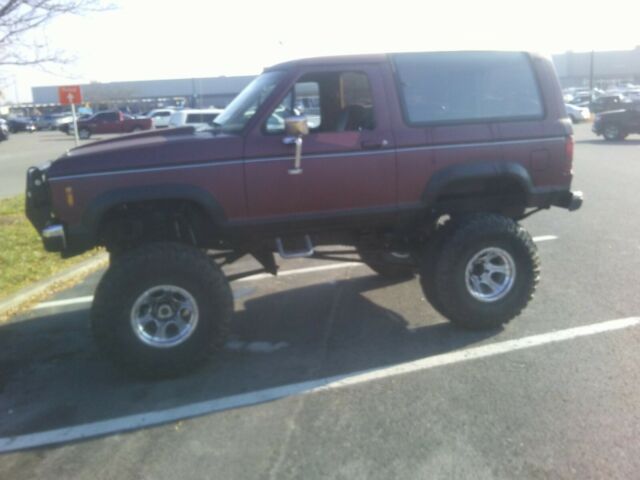 1986 Red Ford Bronco SUV
